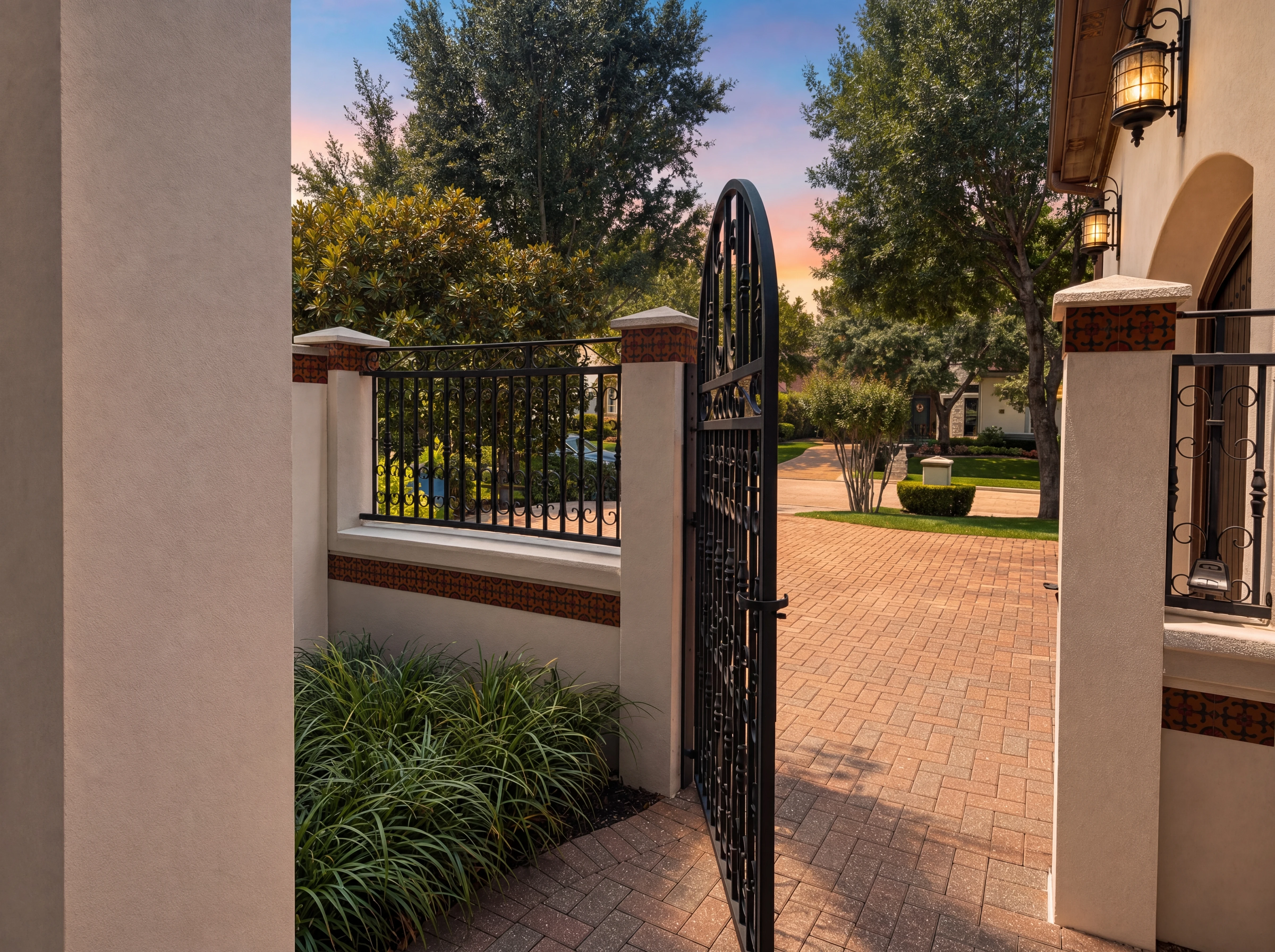 Wrought-iron gate at the street